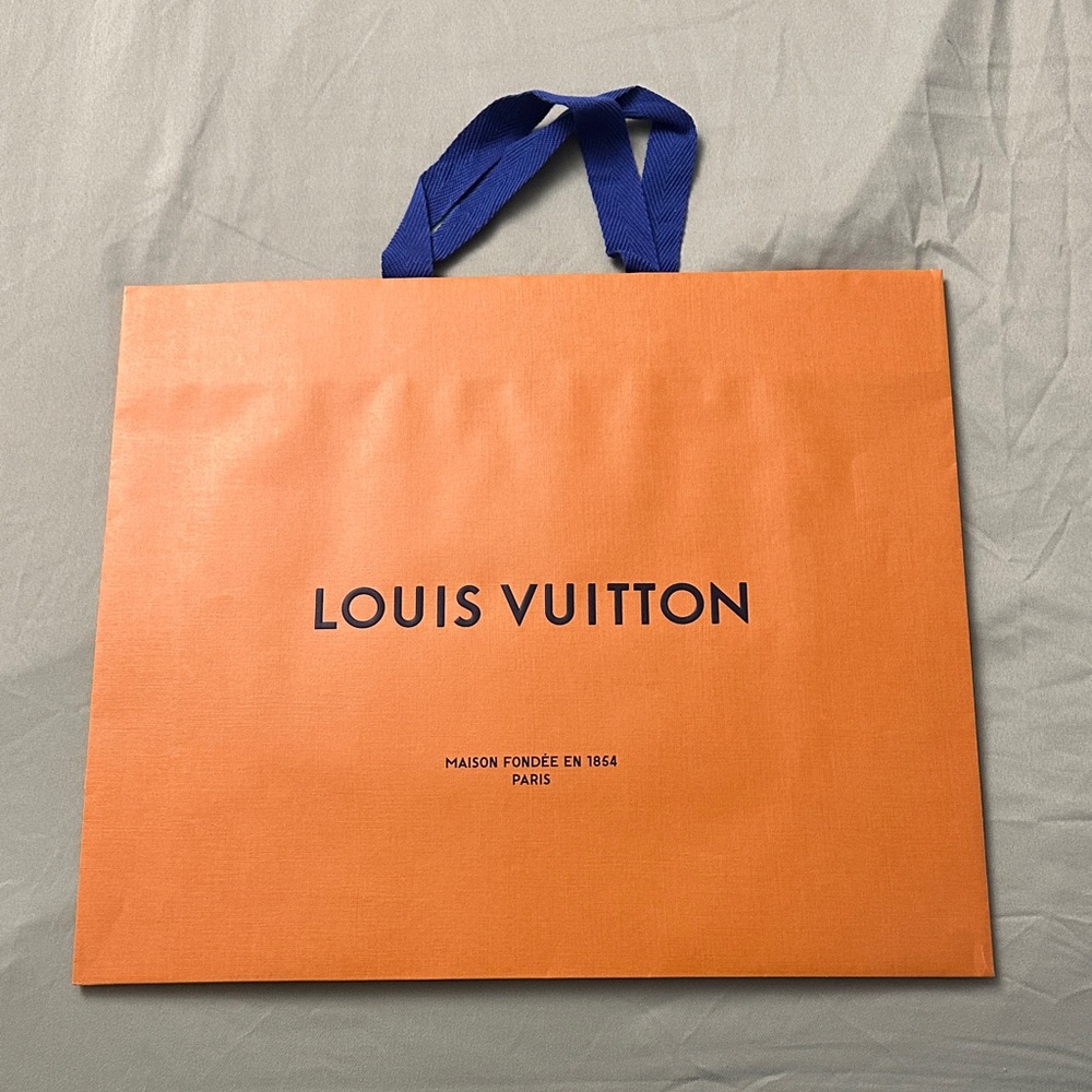 Authentic Louis Vuitton Merchant Bag with Blue Ribbon Handles